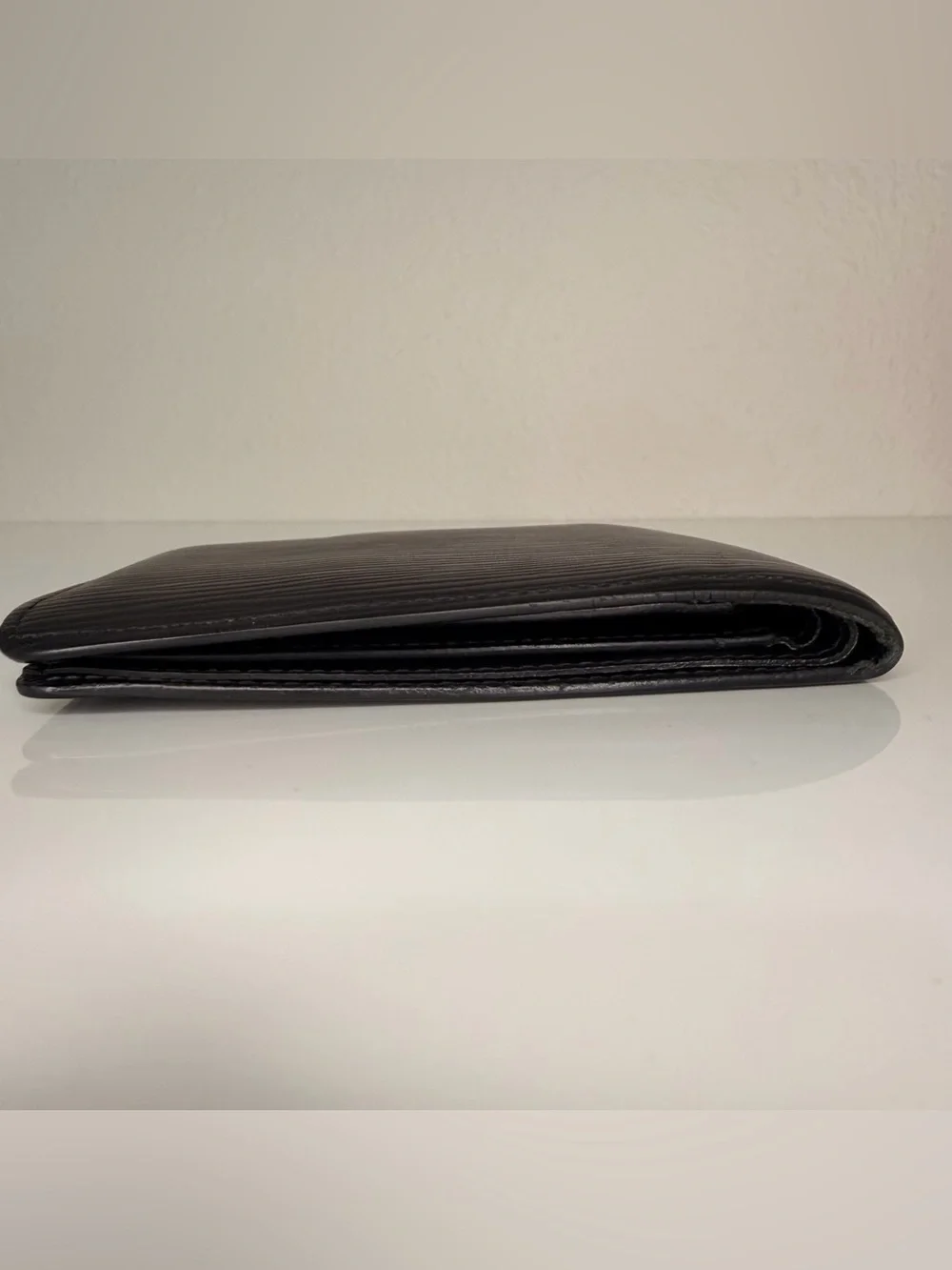 Authentic Louis Vuitton Black Epi Leather Bi-Fold Wallet